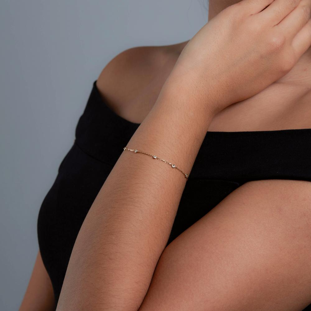 Armband 750/18 K Gelbgold Zirkonia 8 Steine verstellbar Ø3 mm